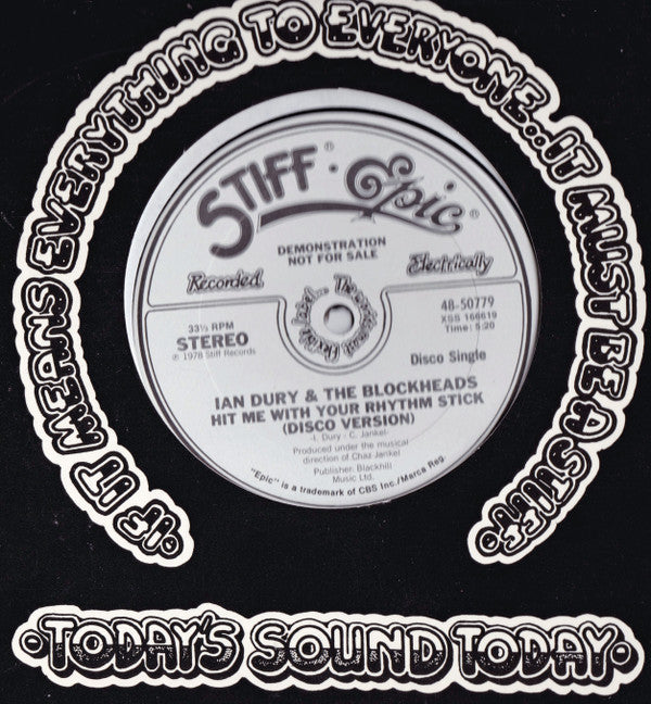 Ian Dury & The Blockheads* : Reasons To Be Cheerful, Pt. 3 / Hit Me With Your Rhythm Stick (12", Single, Promo)