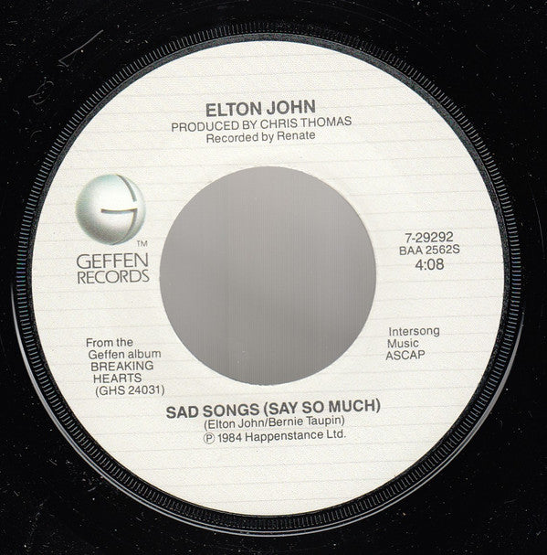Elton John : Sad Songs (Say So Much) (7", Single, Win)