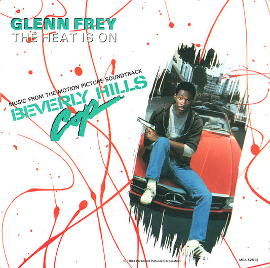 Glenn Frey : The Heat Is On (7", Single, Pin)
