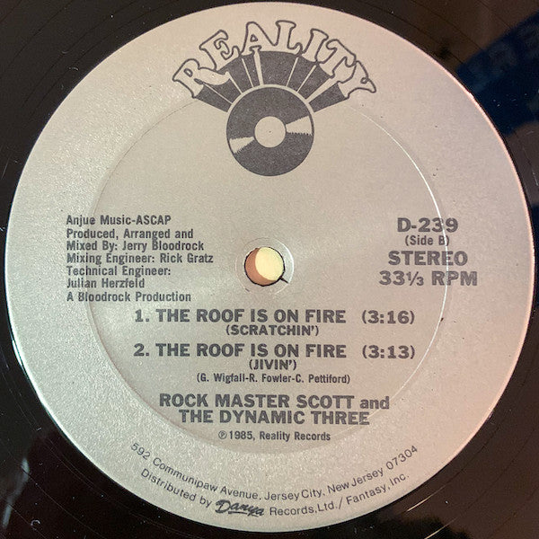 Rock Master Scott And The Dynamic Three : The Roof Is On Fire (12", Pit)