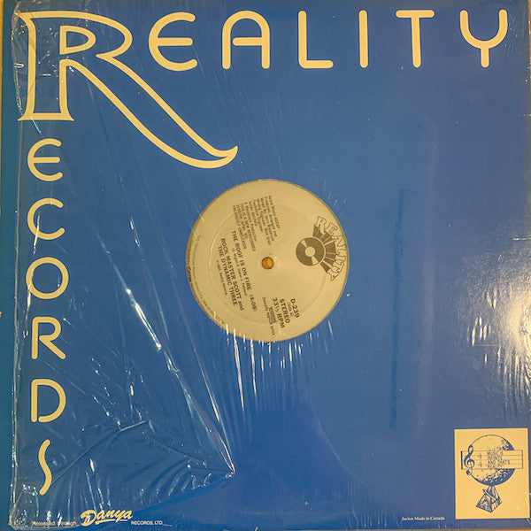 Rock Master Scott And The Dynamic Three : The Roof Is On Fire (12", Pit)