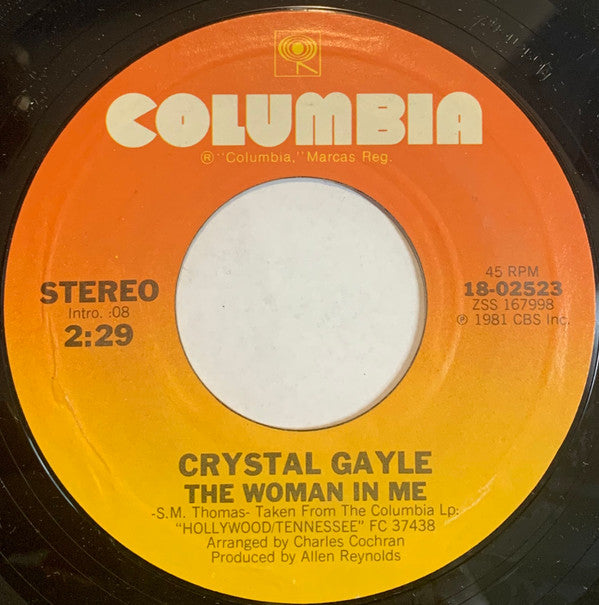 Crystal Gayle : The Woman In Me / Crying In The Rain (7", Pit)