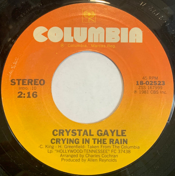 Crystal Gayle : The Woman In Me / Crying In The Rain (7", Pit)